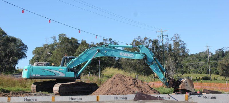teal excavator