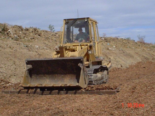 man driving a drott