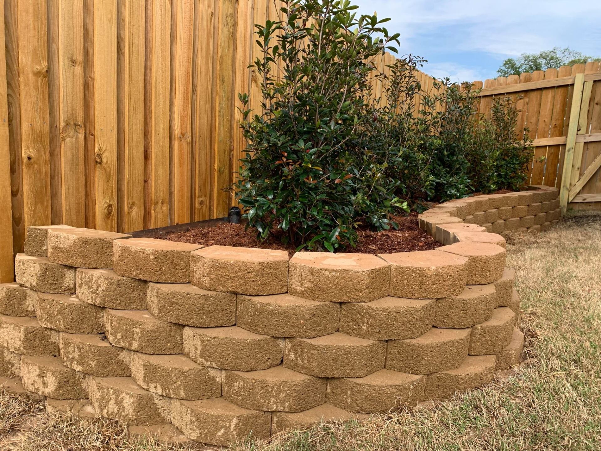 Shaped Retaining Wall — Tyler, TX — Creative Landscape Solutions