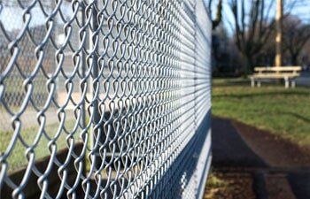 Chain Fence — Fence Contractors & Builders in Springfield, OR Chain Fence — Fence Contractors & Builders in Springfield, OR