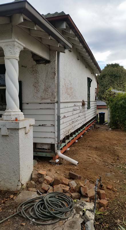 Side view of raised building