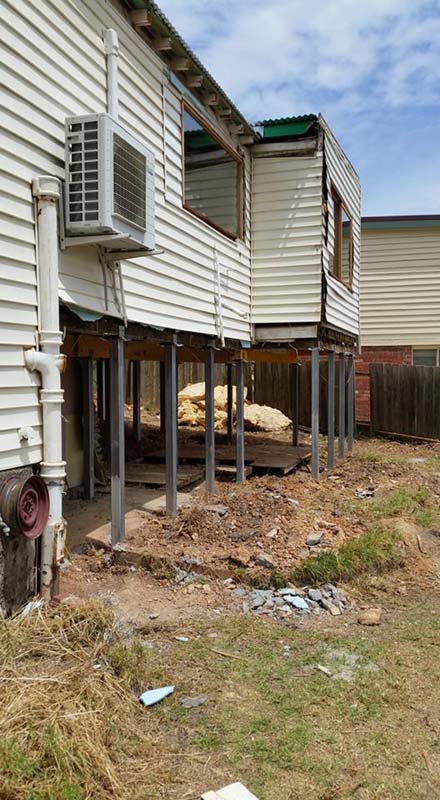 Raised and restumped building