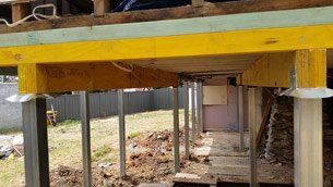Underside of home being raised underside of home being raised
