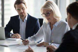 A Woman Discussing About Business Insurance — Morristown, NJ — Robert Lloyd Coutts & Sons