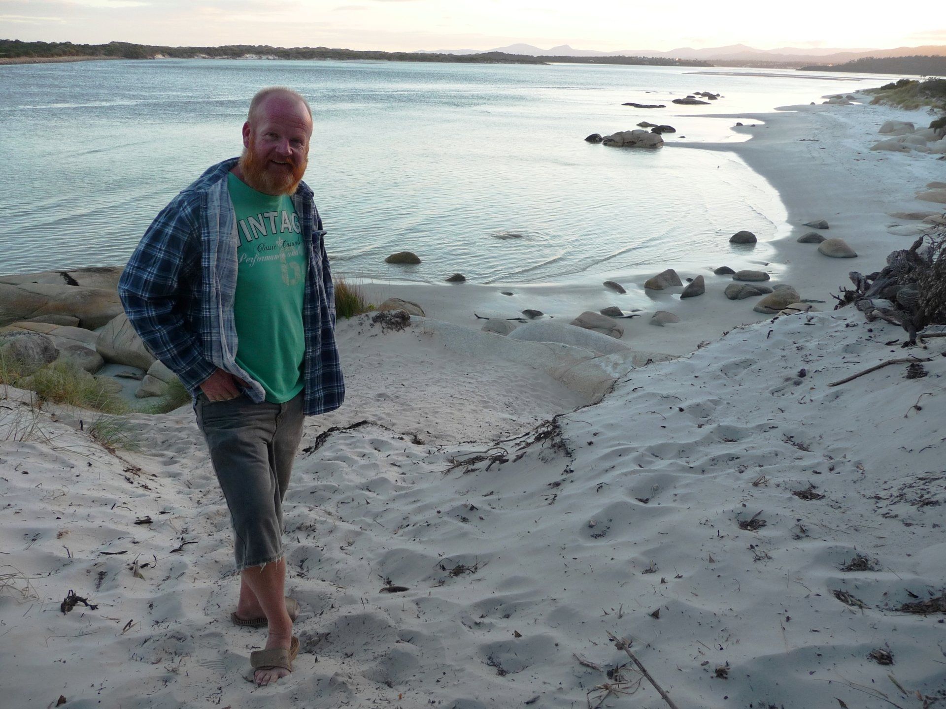 Accountant Greg enjoying the sand and sunset