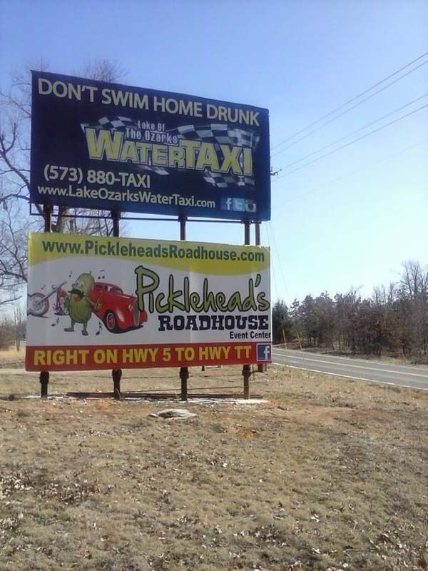 a billboard that says do n't swim home drunk