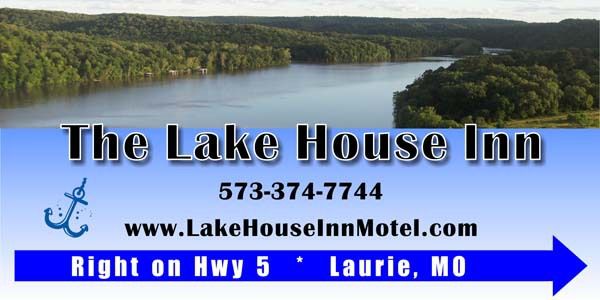 a sign for the lake house inn in laurie mo