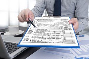 Investment Products | Pointing Form with Pen | Staten Island, NY