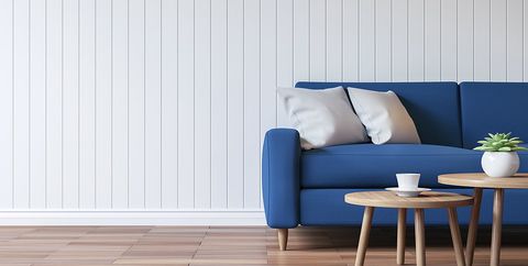 living room with blue couch