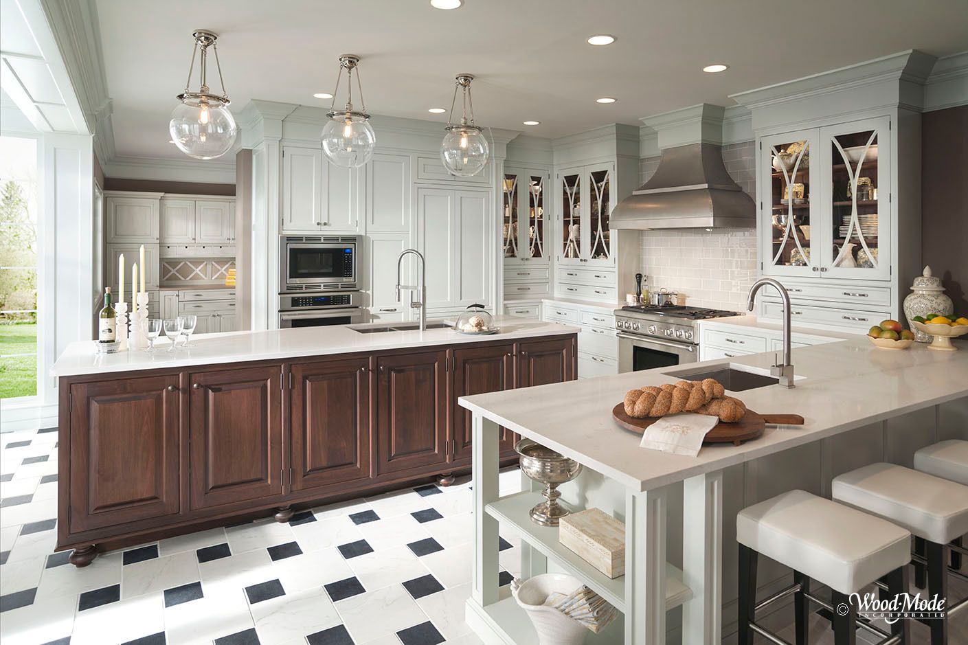 A kitchen with a large island in the middle