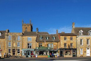buildings and shopfronts made out of traditional Scottish stone materials