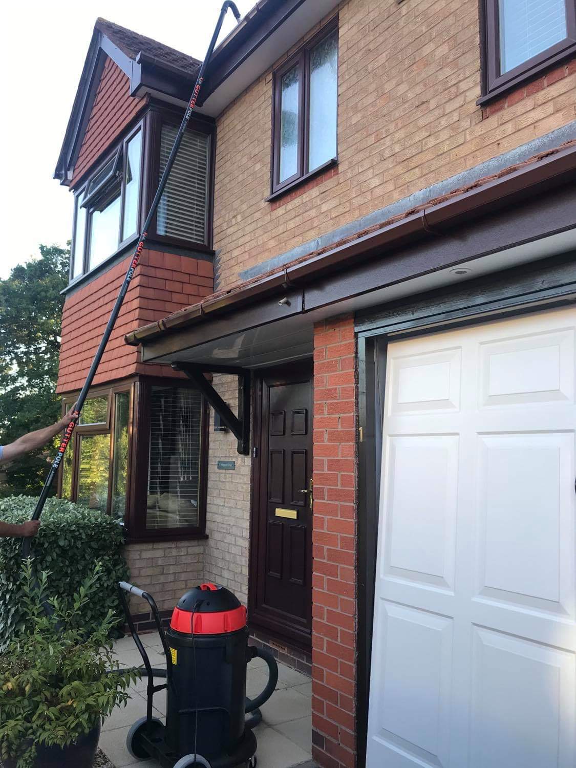 Guttering cleaning from the ground.