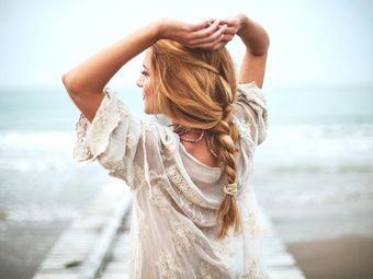 woman with long braided hair