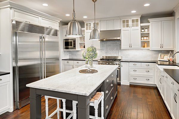 Beautiful Kitchen in Luxury Home — Key West, FL — Conch Construction & Roofing Inc. An after image of a building renovating in Key West, FL .