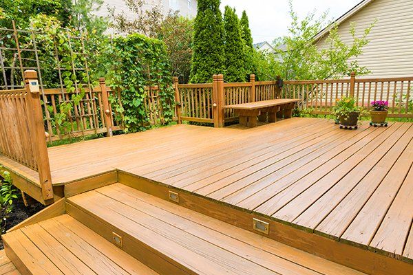 Wooden Deck of Family Home — Key West, FL — Conch Construction & Roofing Inc. Wooden Deck of Family Home — Key West, FL — Conch Construction & Roofing Inc.