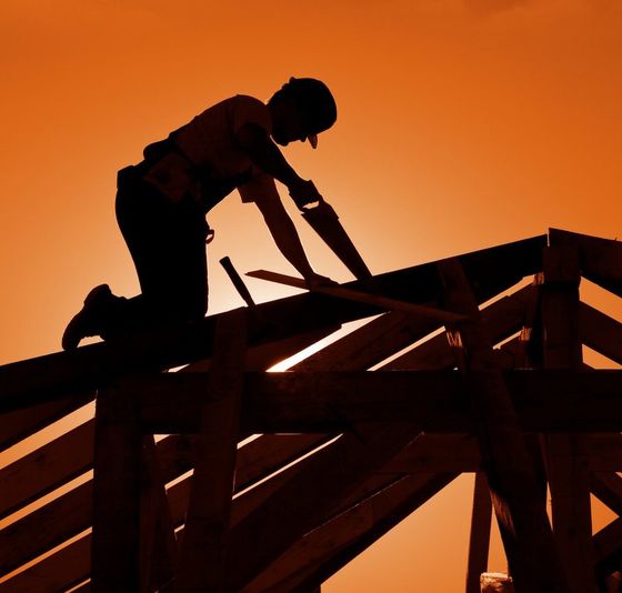 contractor working on building a new roof