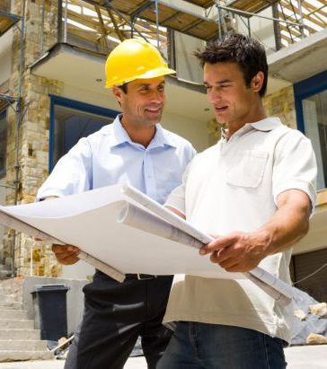 Contractor discussing the construction design