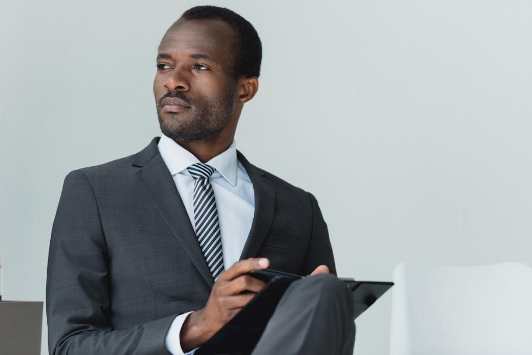 Lawyer Using Tablet — Birmingham, AL —Allen D. Arnold Attorney at Law Lawyer Using Tablet — Birmingham, AL —Allen D. Arnold Attorney at Law
