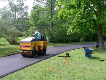 Paver Machine at Road Construction — Kent, WA — Acme Paving & Seal Coating, Inc.