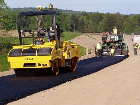 Road Machines Working on the Construction Site — Kent, WA — Acme Paving & Seal Coating, Inc.