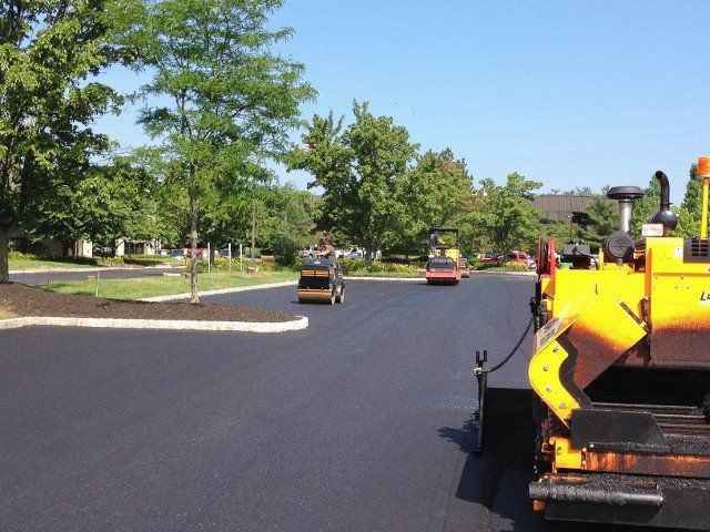 Asphalt Road Machines at Road Construction — Kent, WA — Acme Paving & Seal Coating, Inc.