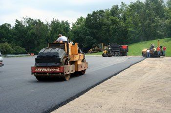 Asphalt Paver Machine — Kent, WA — Acme Paving & Seal Coating, Inc.
