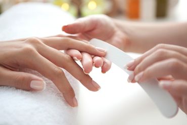 Manicured nails with nail painting as well