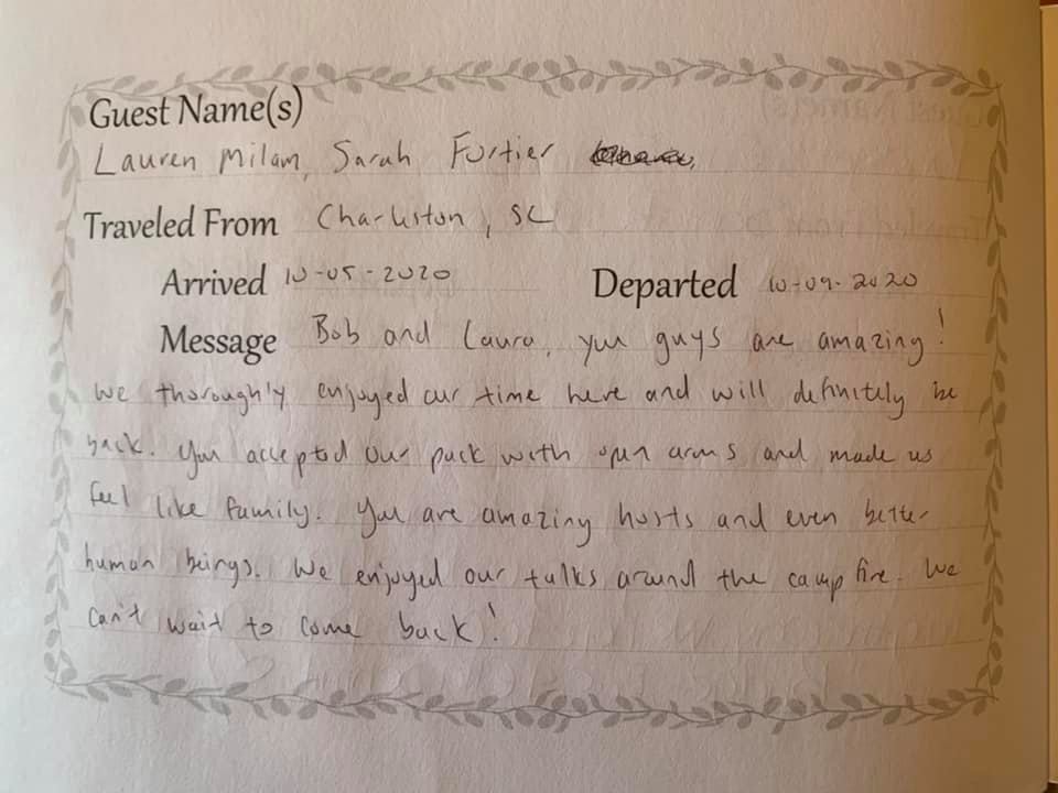 Handwritten guest book page with names, travel dates, and a message in cursive handwriting.