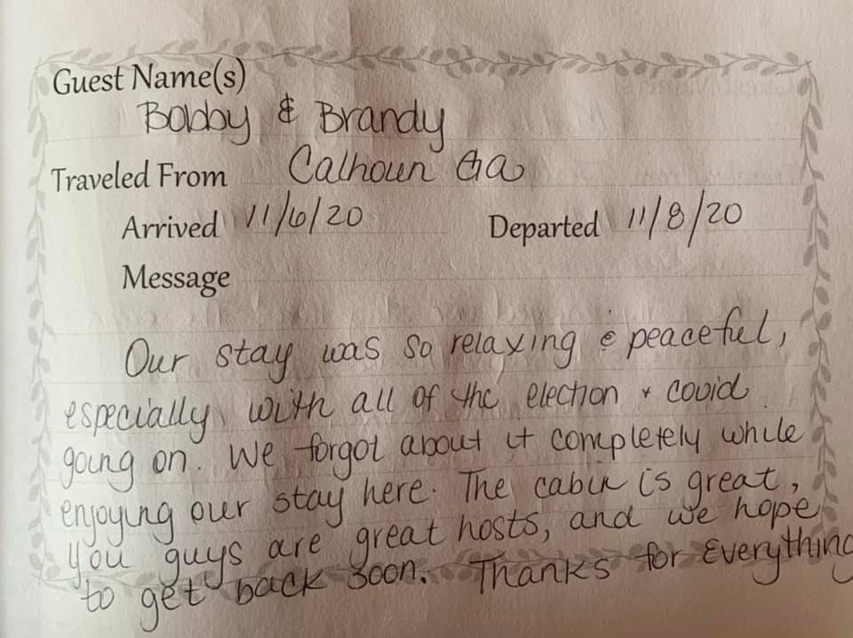 Handwritten guestbook note from Bobby and Brandy praising a relaxing stay at Canyon Cab.