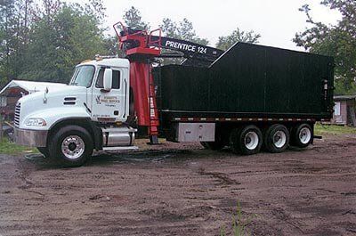 Black and white truck service — Tree Removal in Jacksonville, FL