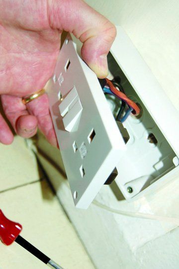 Electrical services - Palgrave, Norfolk - electrician working on a light switch - DAVID PEACHEY ELECTRICAL AND MECHANICAL Electrical services - Palgrave, Norfolk - electrician working on a light switch - DAVID PEACHEY ELECTRICAL AND MECHANICAL