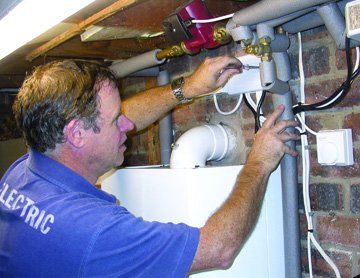 Electrical services - Palgrave, Norfolk - electrician working on central heating - DAVID PEACHEY ELECTRICAL AND MECHANICAL Electrical services - Palgrave, Norfolk - electrician working on central heating - DAVID PEACHEY ELECTRICAL AND MECHANICAL