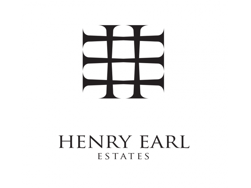 A black and white logo for henry earl estates