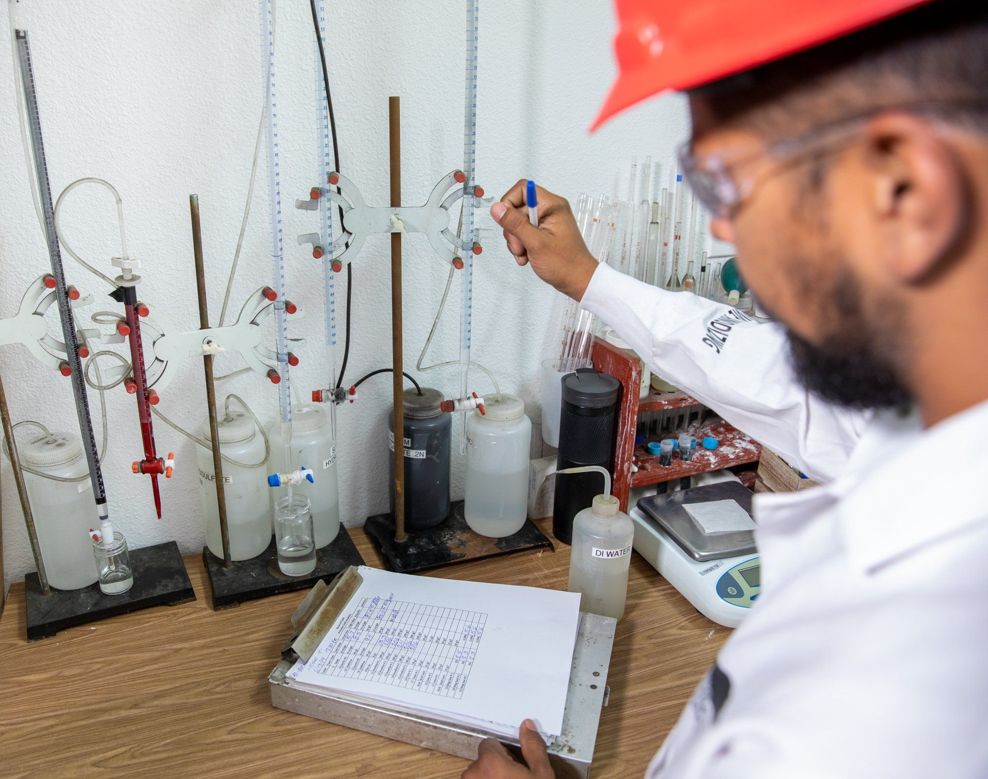 Desk with test tubes and chemical containers