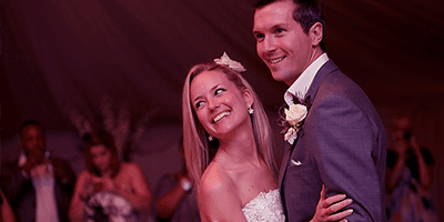 bride and groom smiling