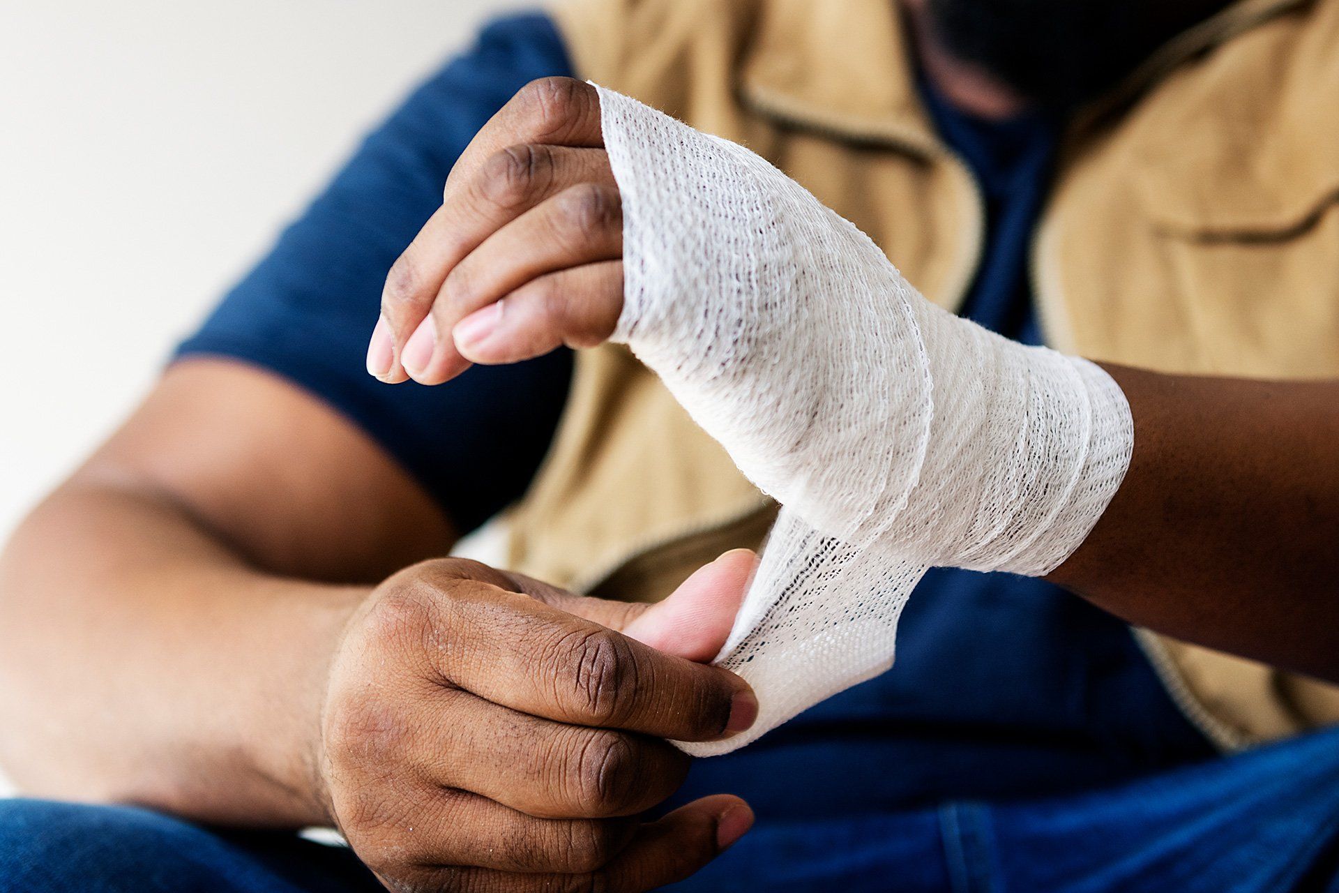 Man with Bandaged Hand — Fairmont, WV — Higinbotham & Higinbotham, PLLC Man with Bandaged Hand — Fairmont, WV — Higinbotham & Higinbotham, PLLC