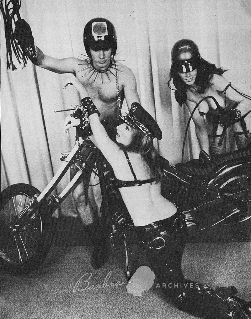 Barbra and two other actors portray adult movie stars dressed in leather.