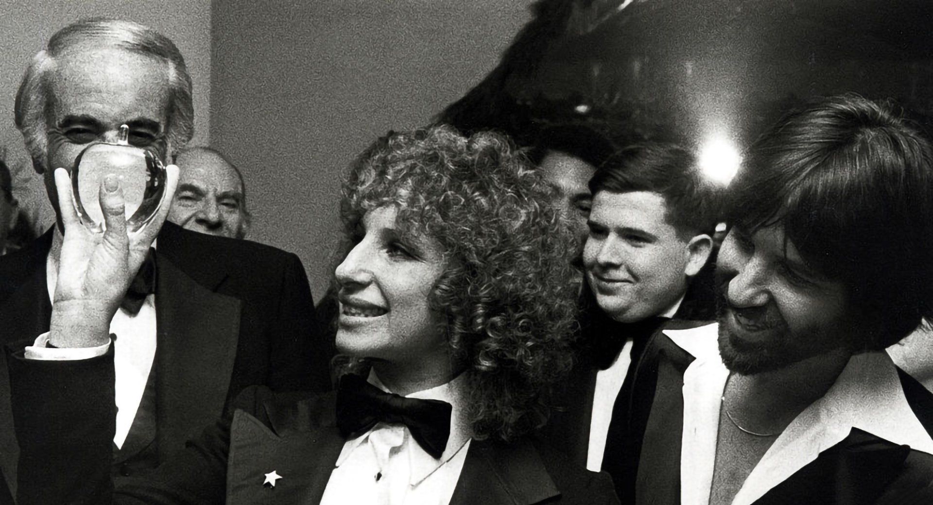 Barbra Streisand holds the Crystal Apple Award, 1976, presented to her by the City of New York.