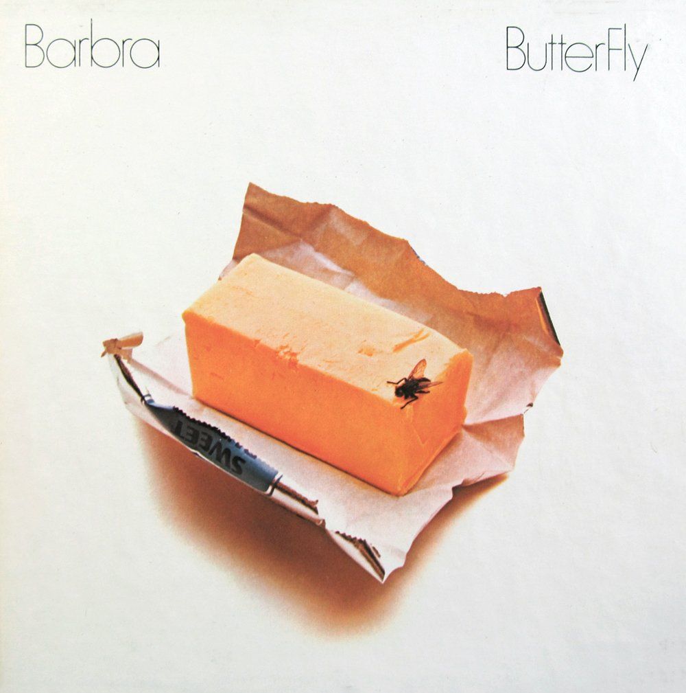 The cover of the reel-to-reel tape box had a closer crop on the fly and stick of butter.