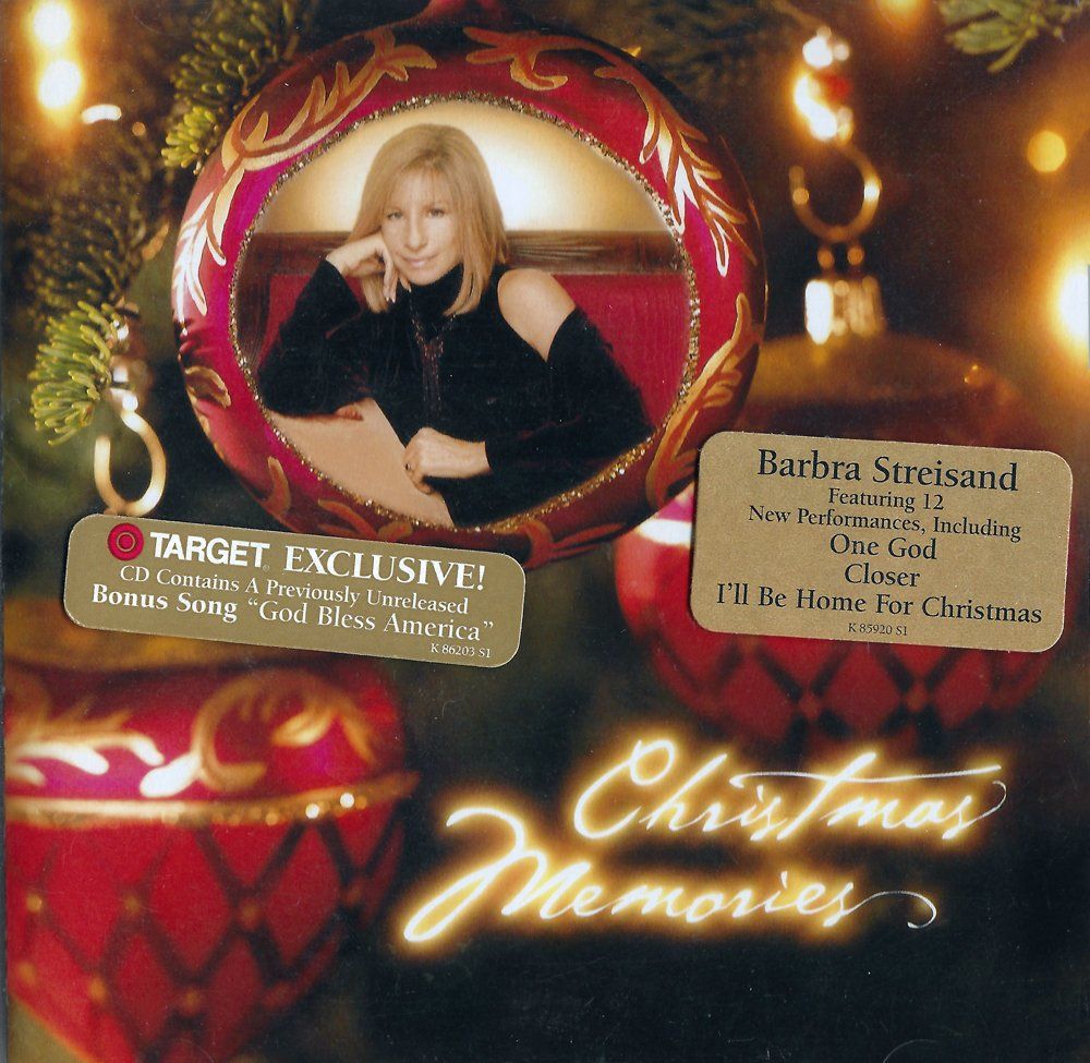 Barbra Streisand Christmas Memories album cover with red holiday ornaments and glowing lights. Features a Target Exclusive sticker.