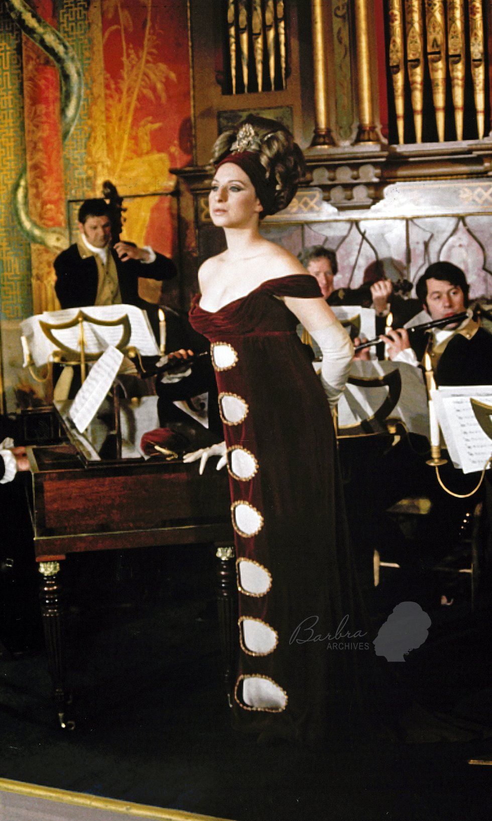 Closeup of Melinda standing in front of the band.