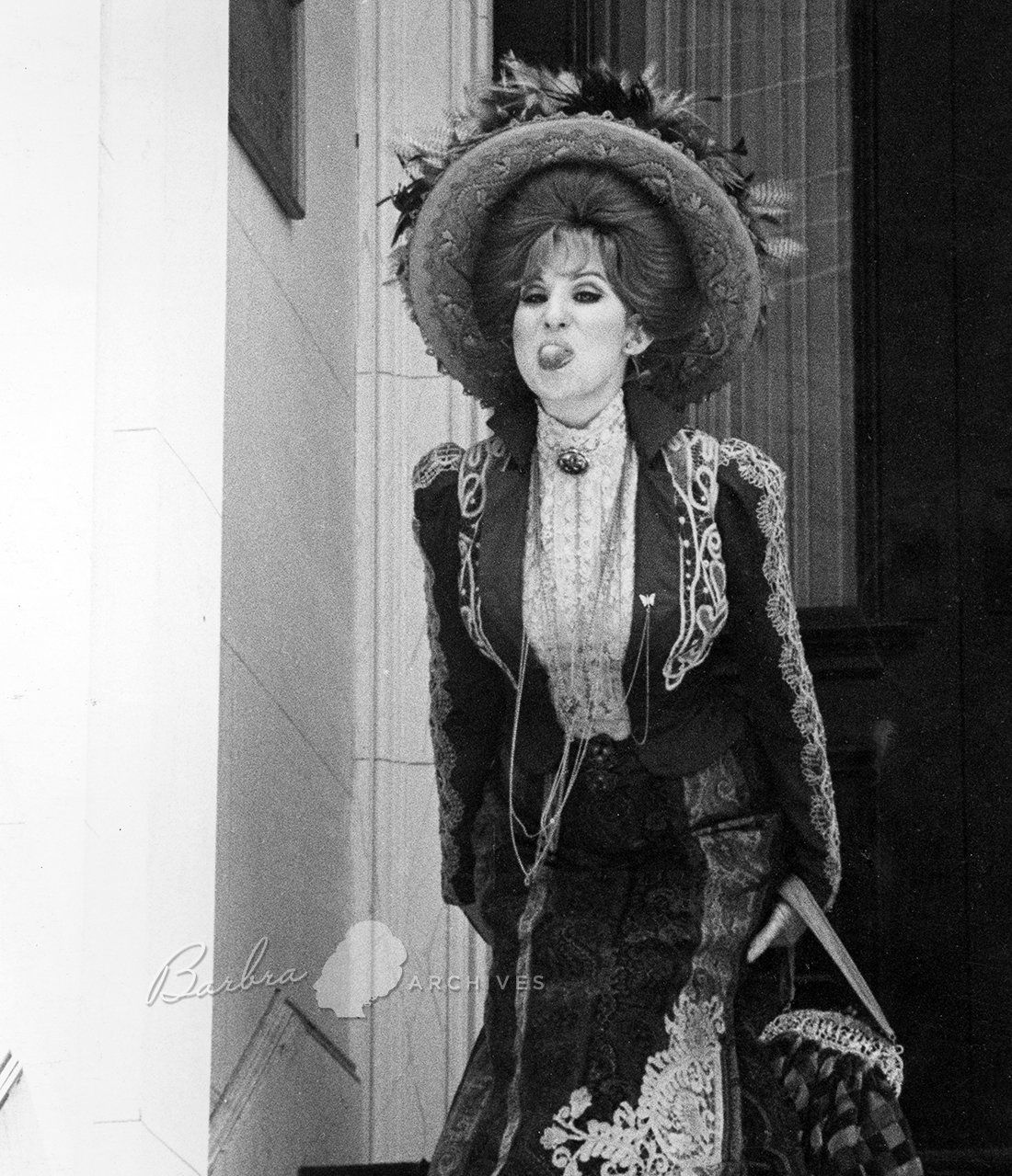 Barbra Streisand on set sticking her tongue out