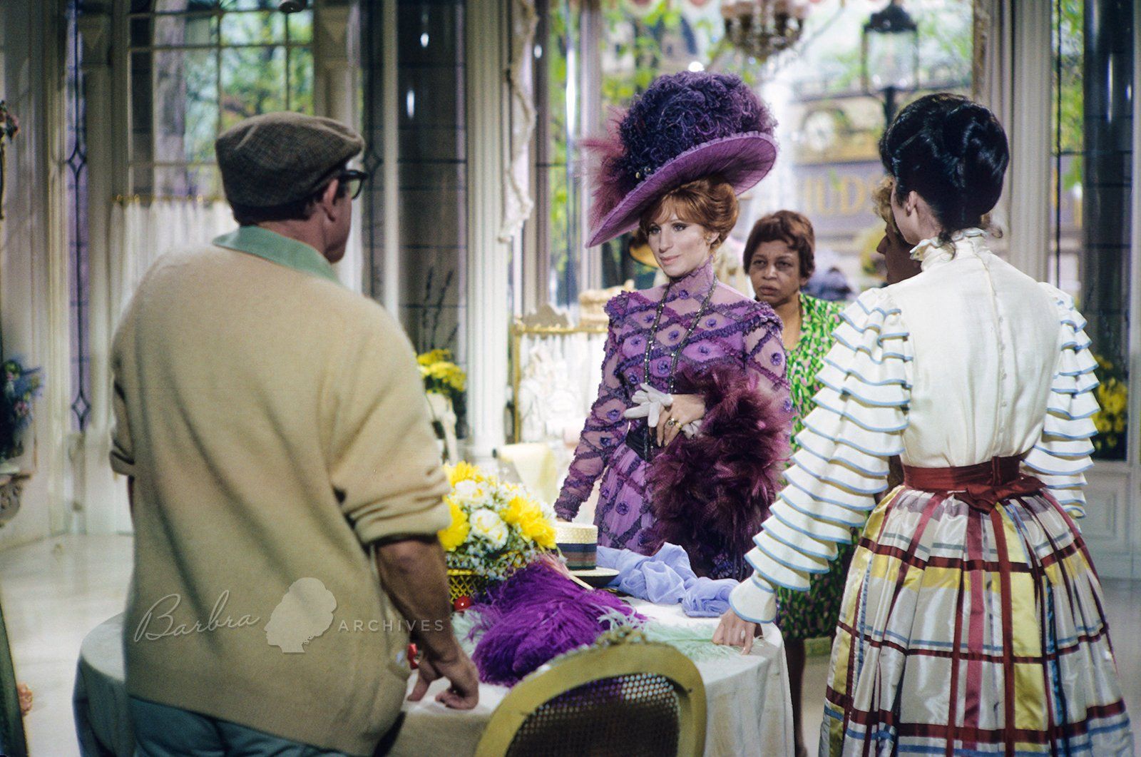Gene Kelly directs Streisand as her dresser and Marianne McAndrew look on.