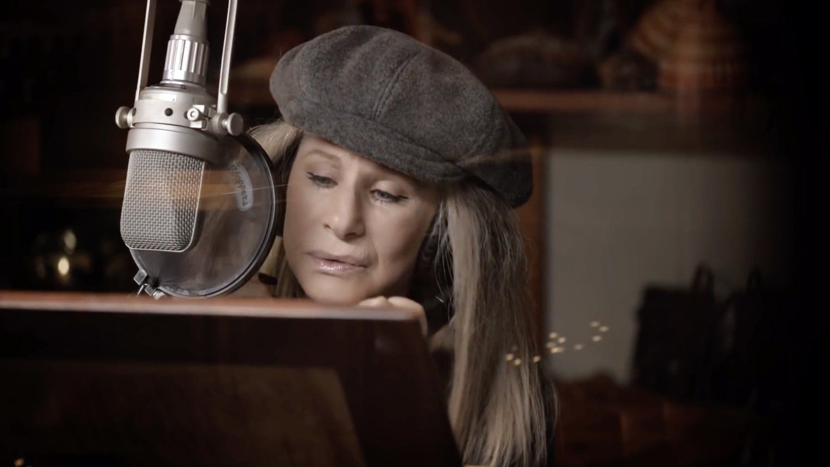 Streisand at the microphone, recording at Woodshed Studio.