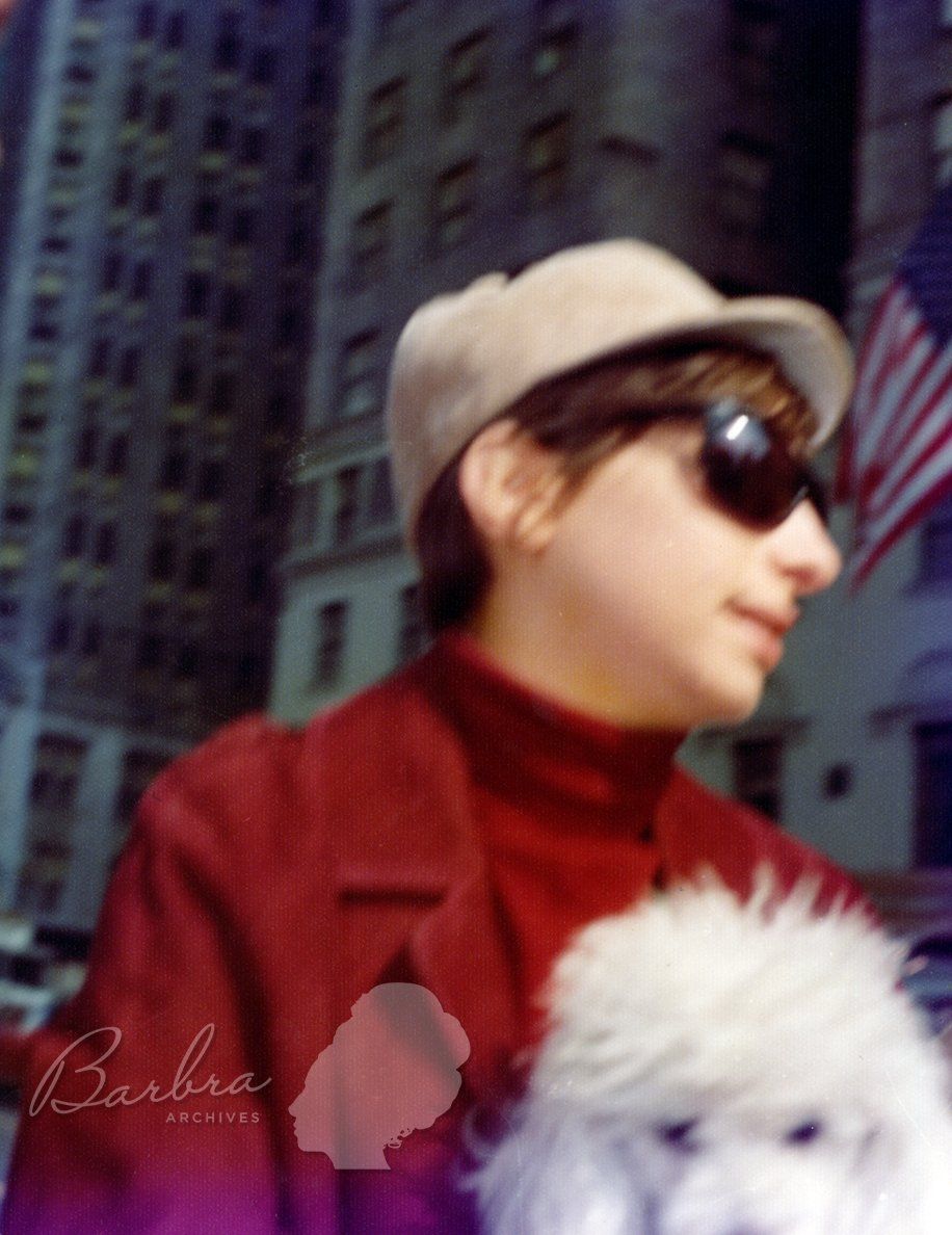 Streisand and dog Sadie on their way to a Funny Girl show.