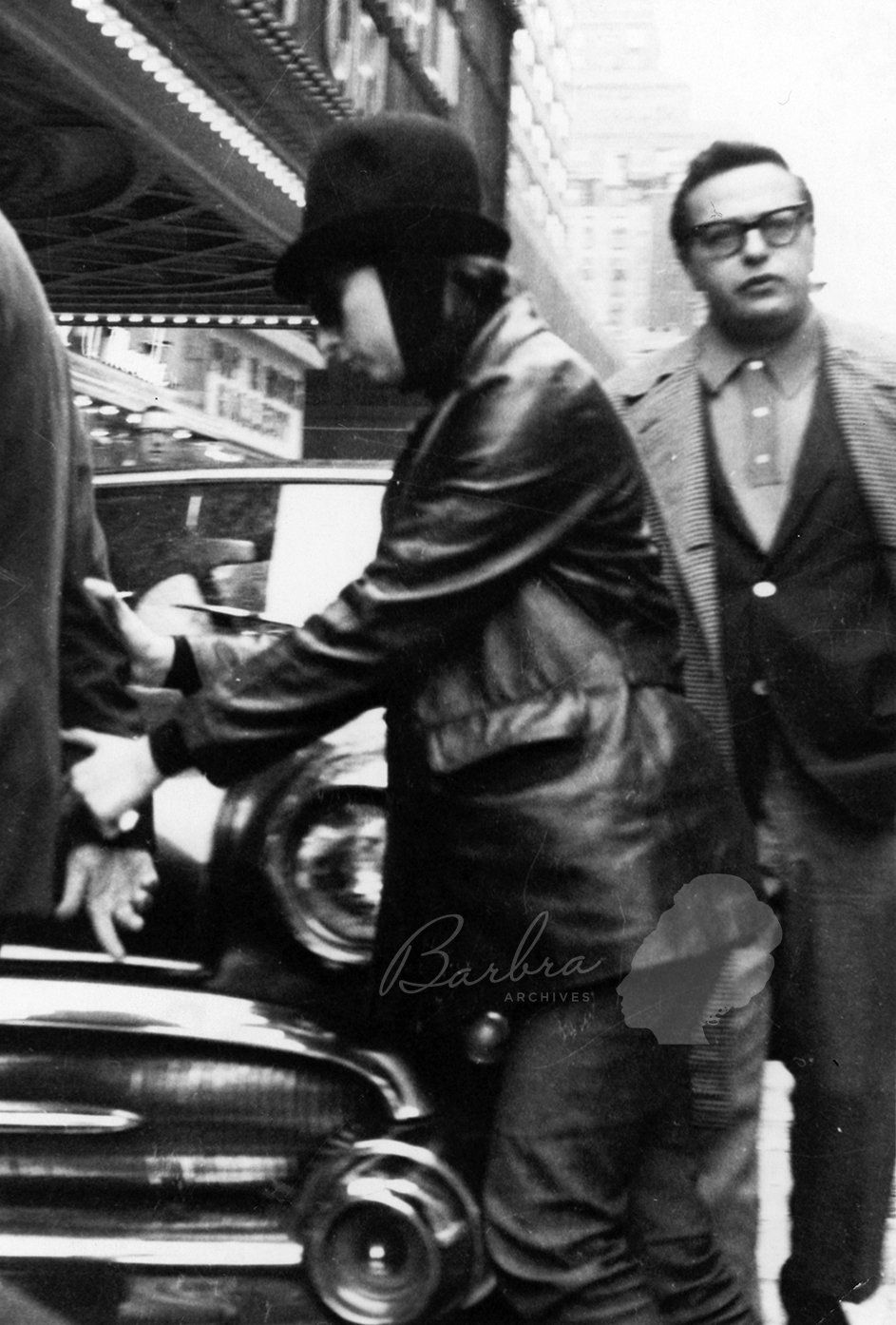 Streisand and Marty Erlichman outside the Winter Garden Theatre.