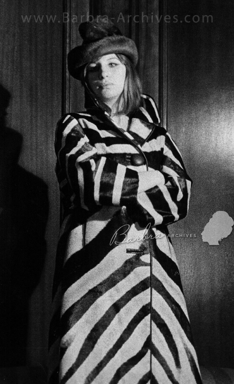 Streisand wearing vintage coat.