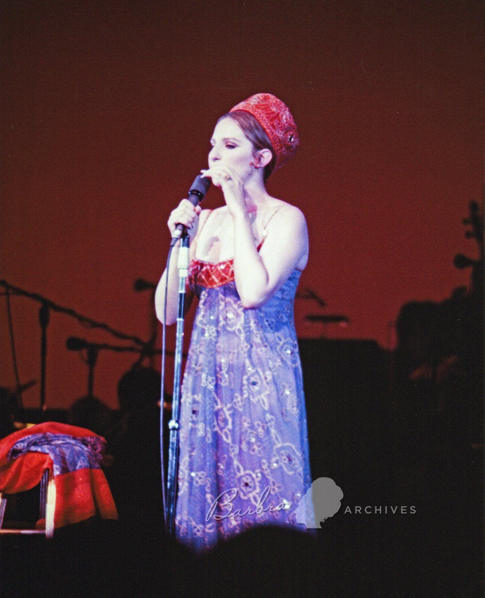 Streisand has removed the sari covering. Photo by: Borsari.