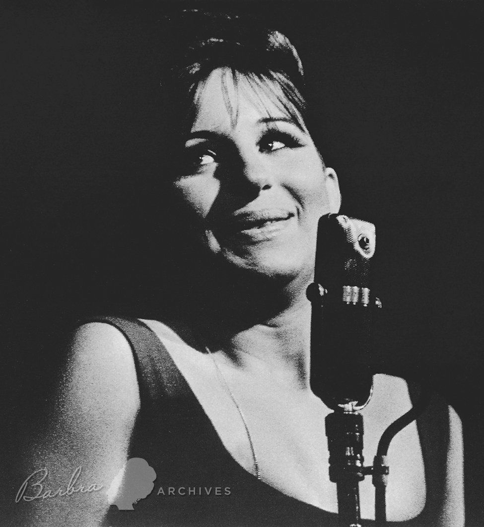 Photo of Barbra Streisand at the microphone at the hungry i. Photo by Grover Sales.