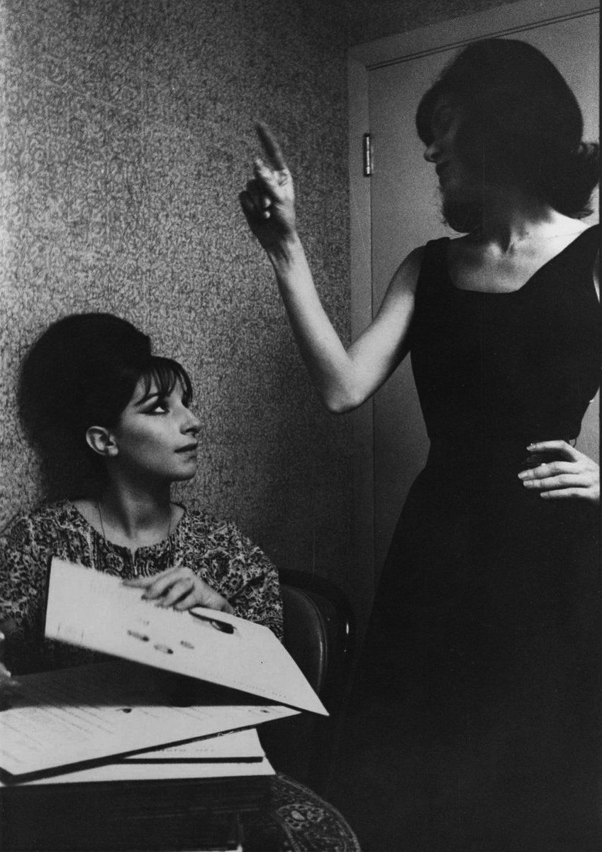 Streisand signing albums with Arlyne Rothberg.